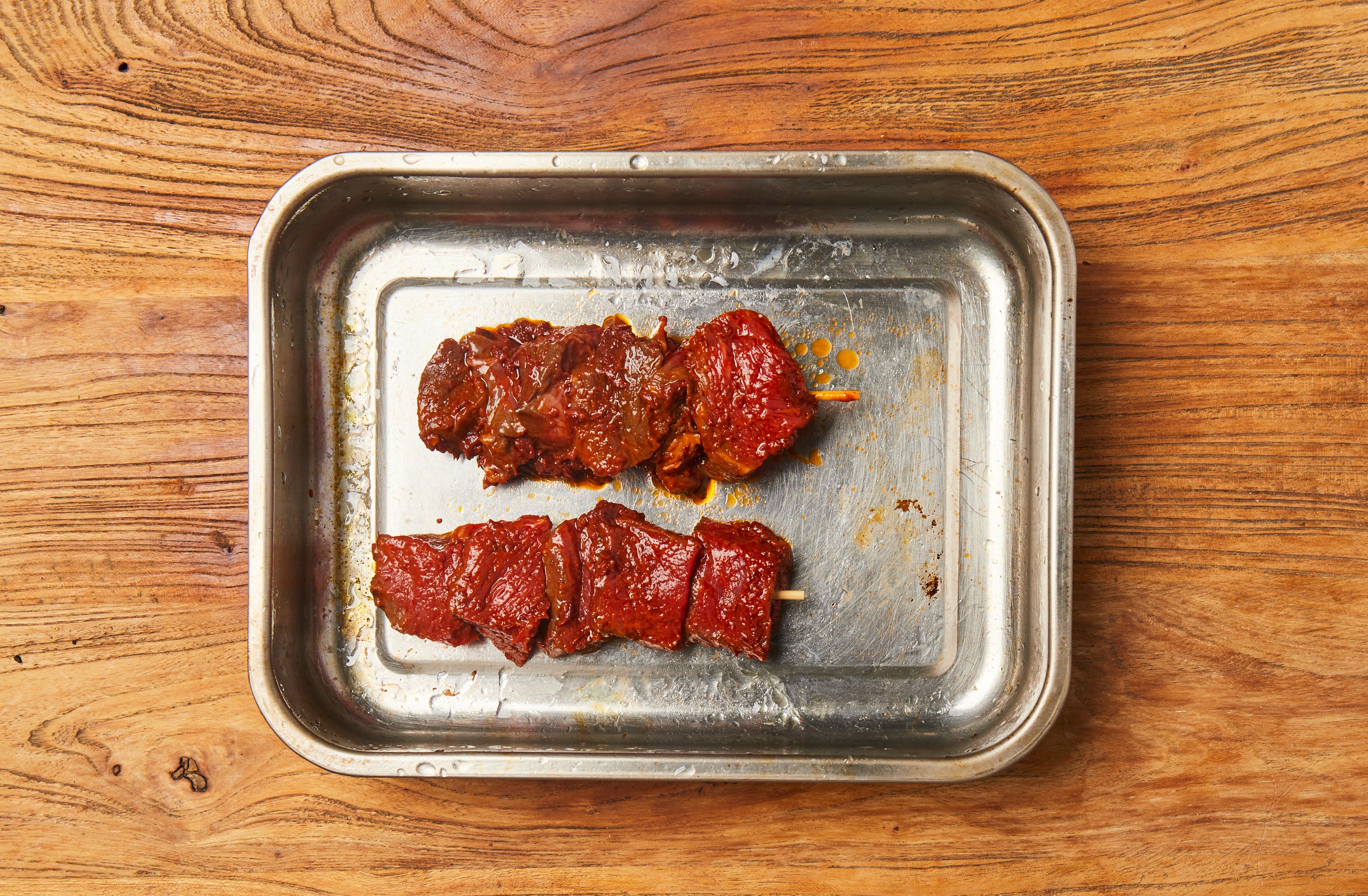 Marinated Beef Skewers with Spiced Capsicum Paste, Hummus & Pickled Carrots