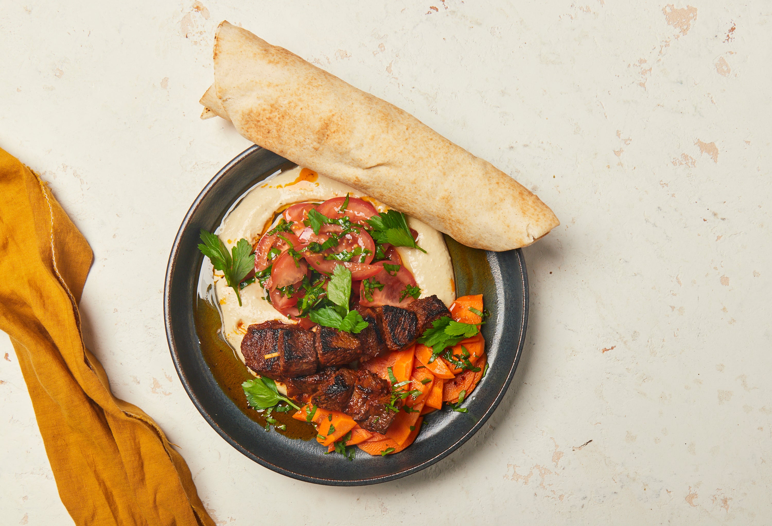 Marinated Beef Skewers with Spiced Capsicum Paste, Hummus & Pickled Carrots